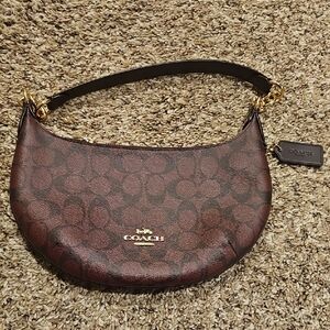 Coach Signature Brown Shoulder Bag. This Is More Of A Wine Color.